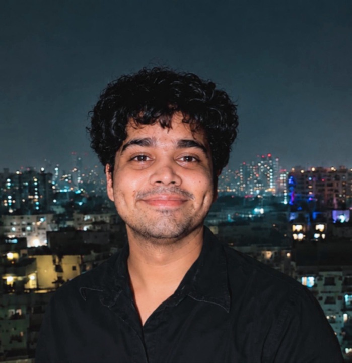Nikhil Verma on a rooftop in Mumbai at night